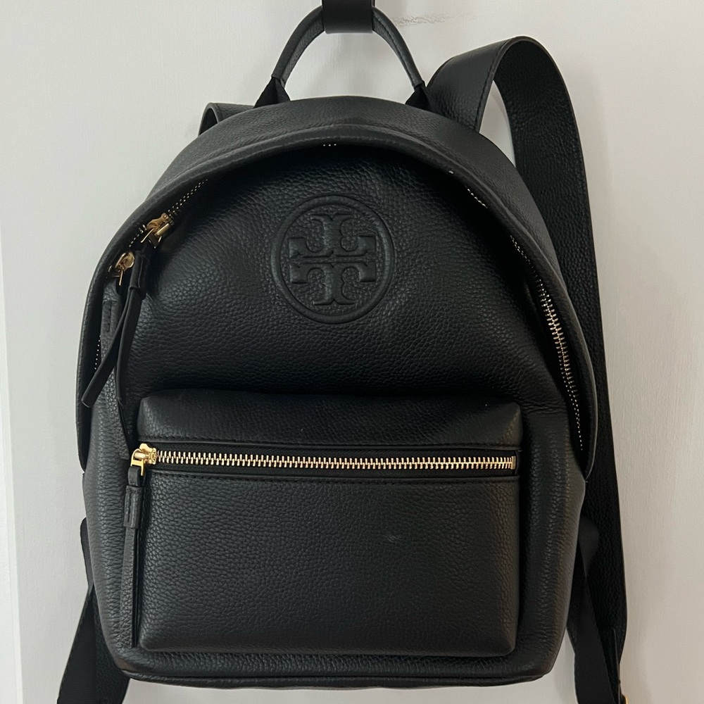 No scratches, no stains inside and out, zippers work fine, and no smoke smell.